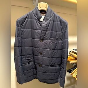 Brunello Cucinelli men’s quilted navy jacket.